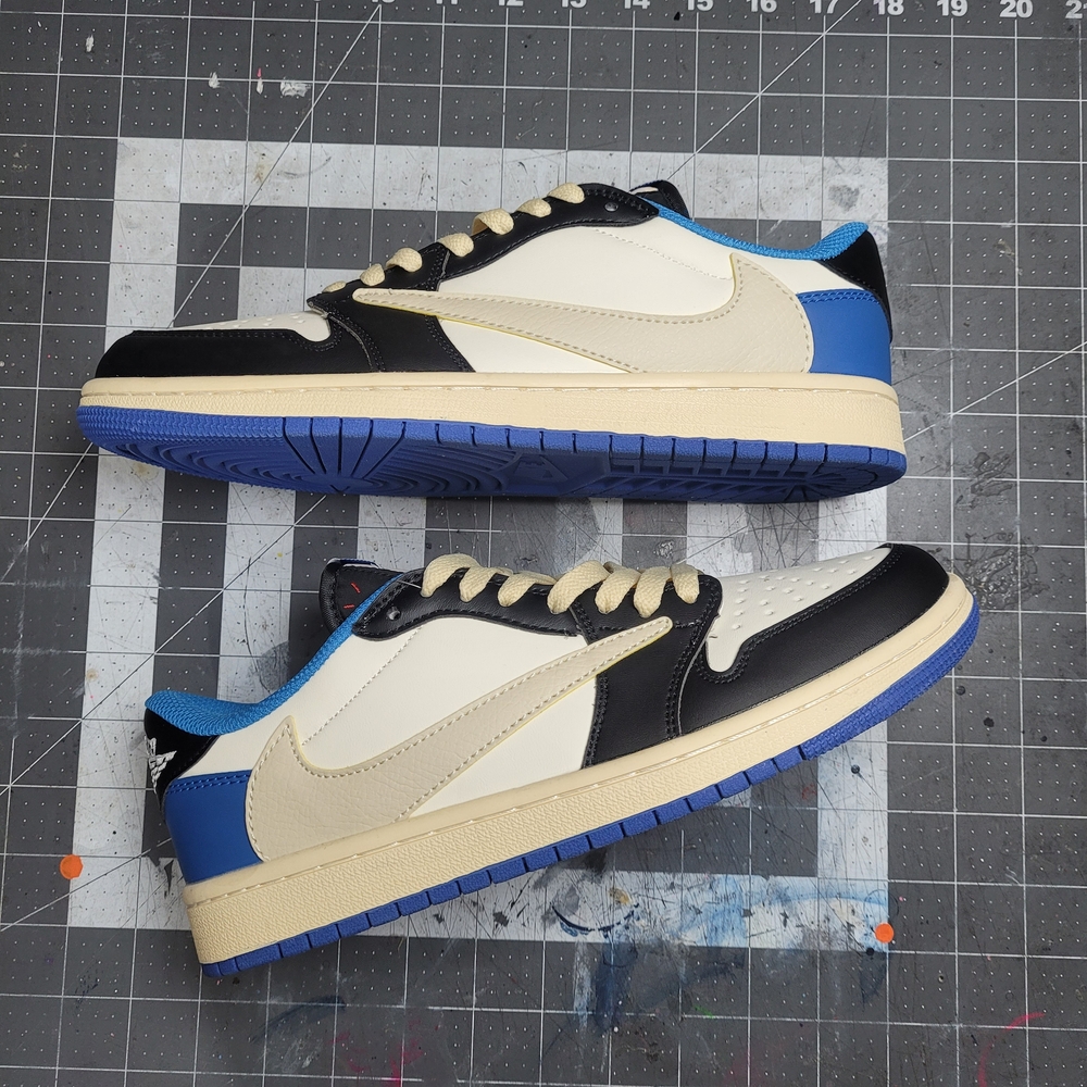 Travis Scott Air Jordan Sneakers in Cream, Black & Blue